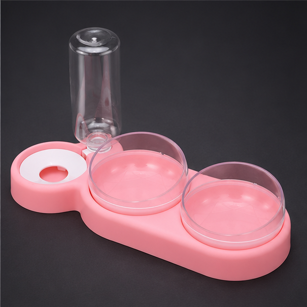 Comedero rosa Velnuki Pets DualDine Station™ para perros con dispensador automático de agua y comida.